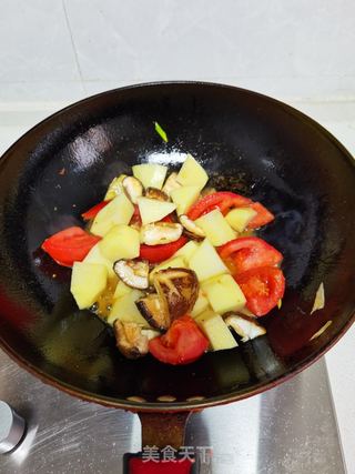 土豆炖三鲜的做法步骤:9