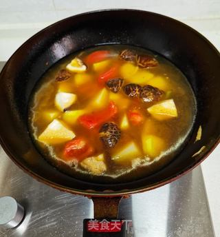 土豆炖三鲜的做法步骤:11