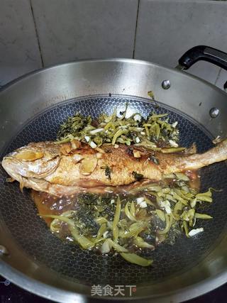 酸菜炖黄花鱼的做法步骤:12
