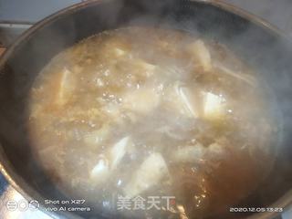 鸡肉酸菜炖豆腐的做法步骤：5