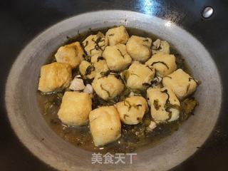酸菜焖豆泡的做法步骤:9