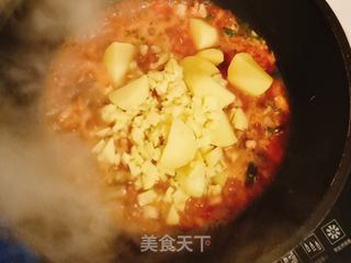 土豆油焖鸡的做法步骤:9