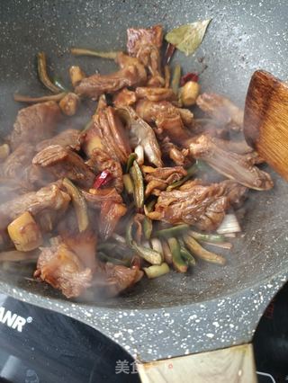 萝卜干烧羊肉的做法步骤:16
