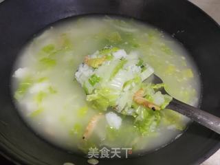 娃娃菜海鲜粥的做法步骤:11