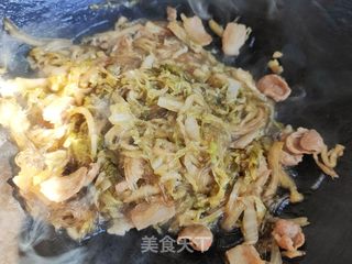 五花肉粉丝炖酸菜的做法步骤:17